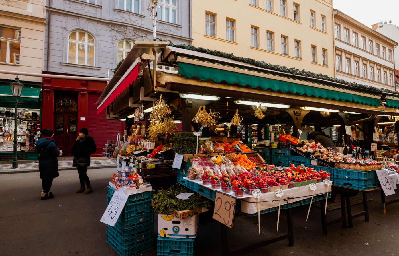 A market stall filled with fresh food.
